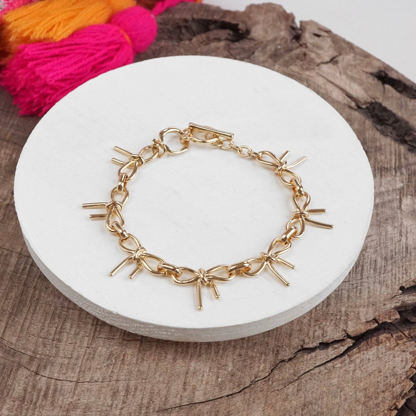 Bow Link Bracelet Gold Tone 2797