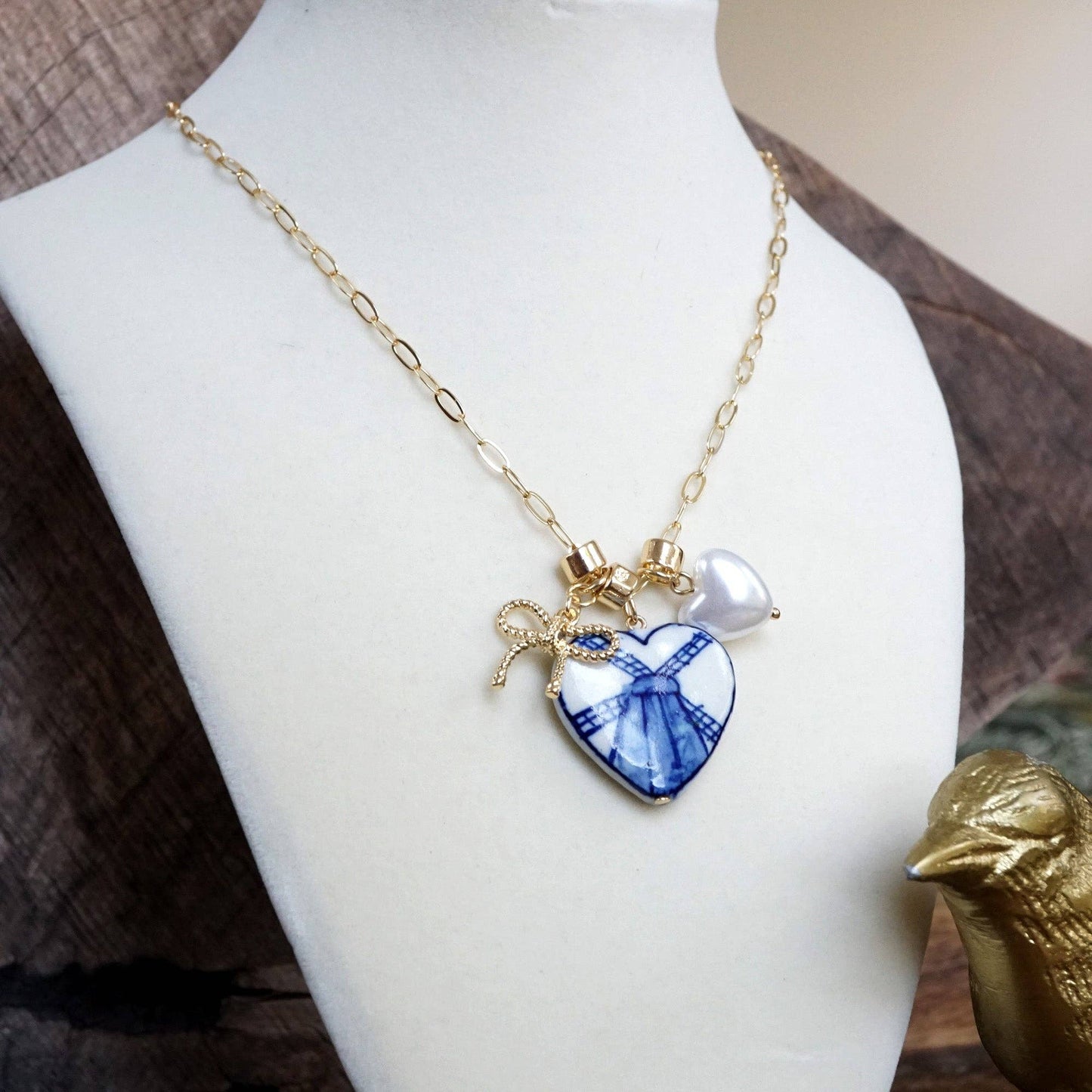 Multi-Charm Chinoiserie Heart & Bow Necklace – Blue & Gold