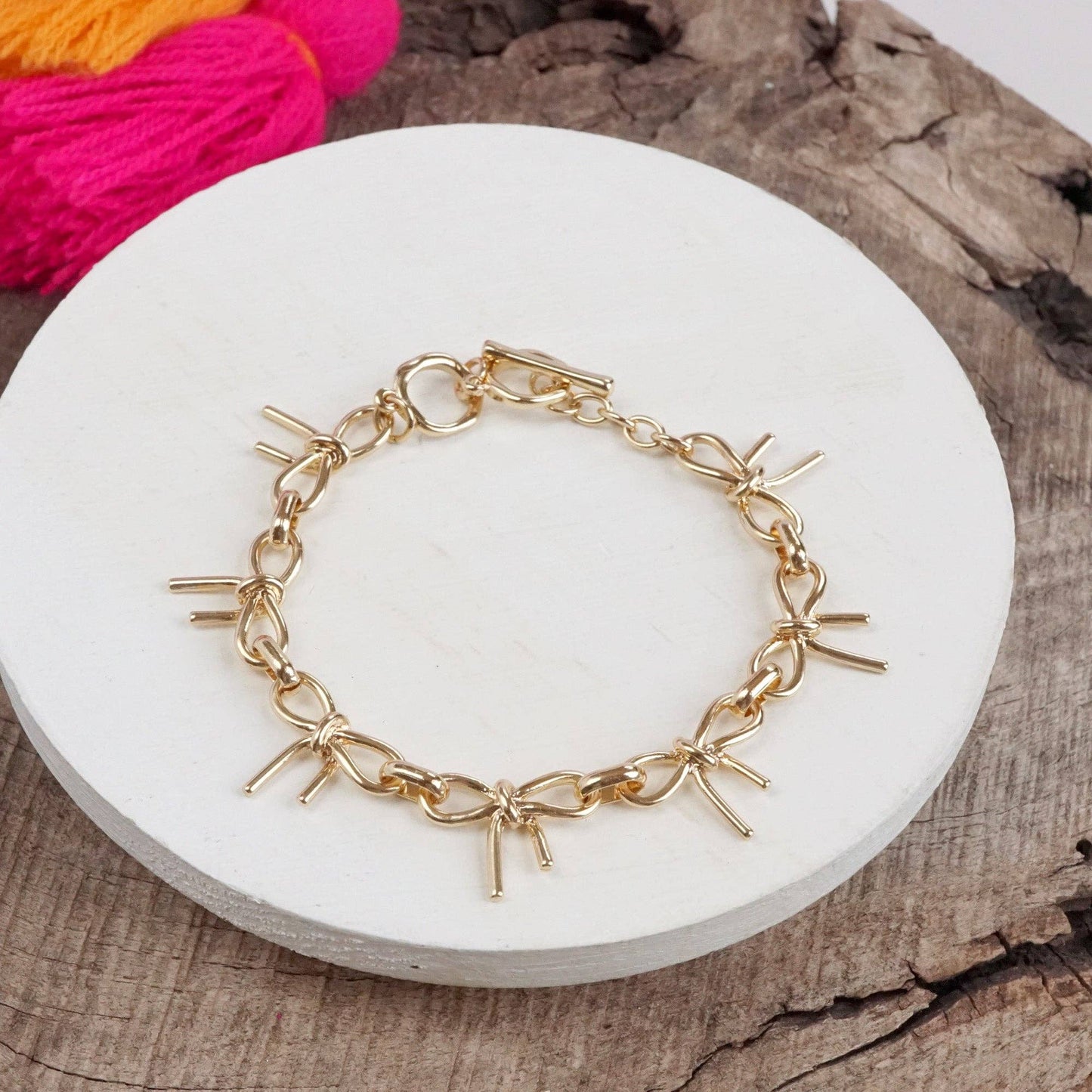 Bow Link Bracelet Gold Tone 2797