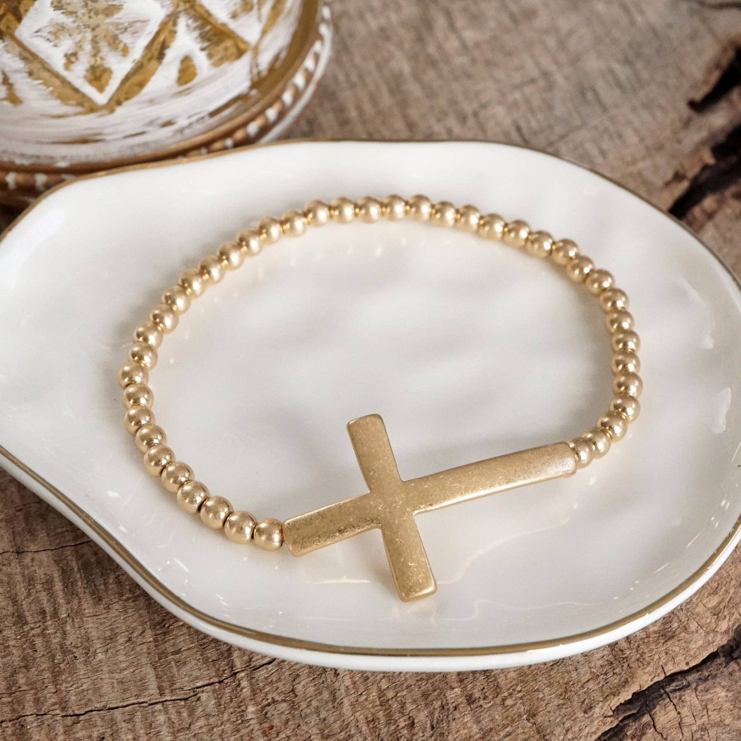 Minimal Cross Stretchy Bracelet in Worn Gold