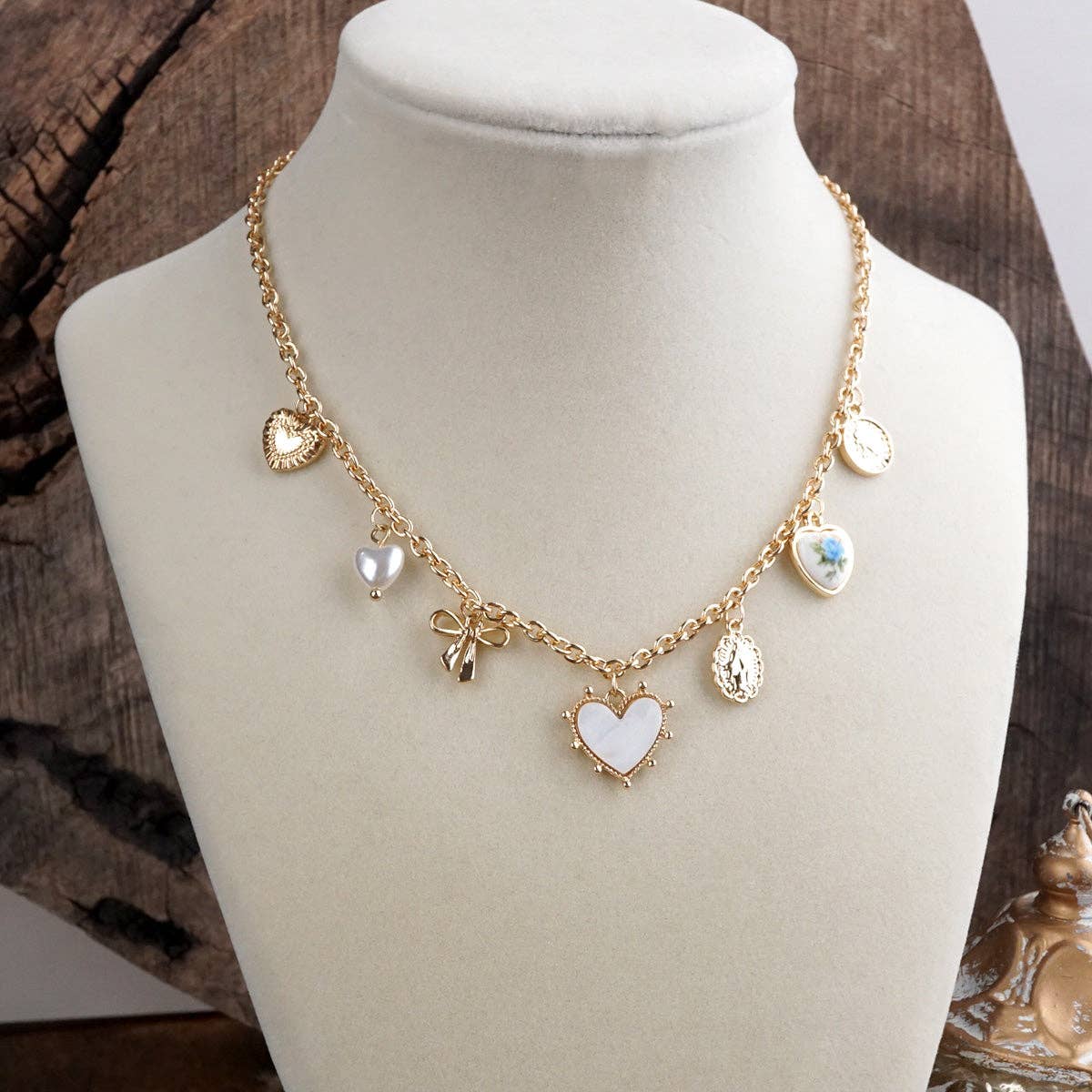 Keepsake Hearts – Multi-Charm Heart Necklace in Gold Tone