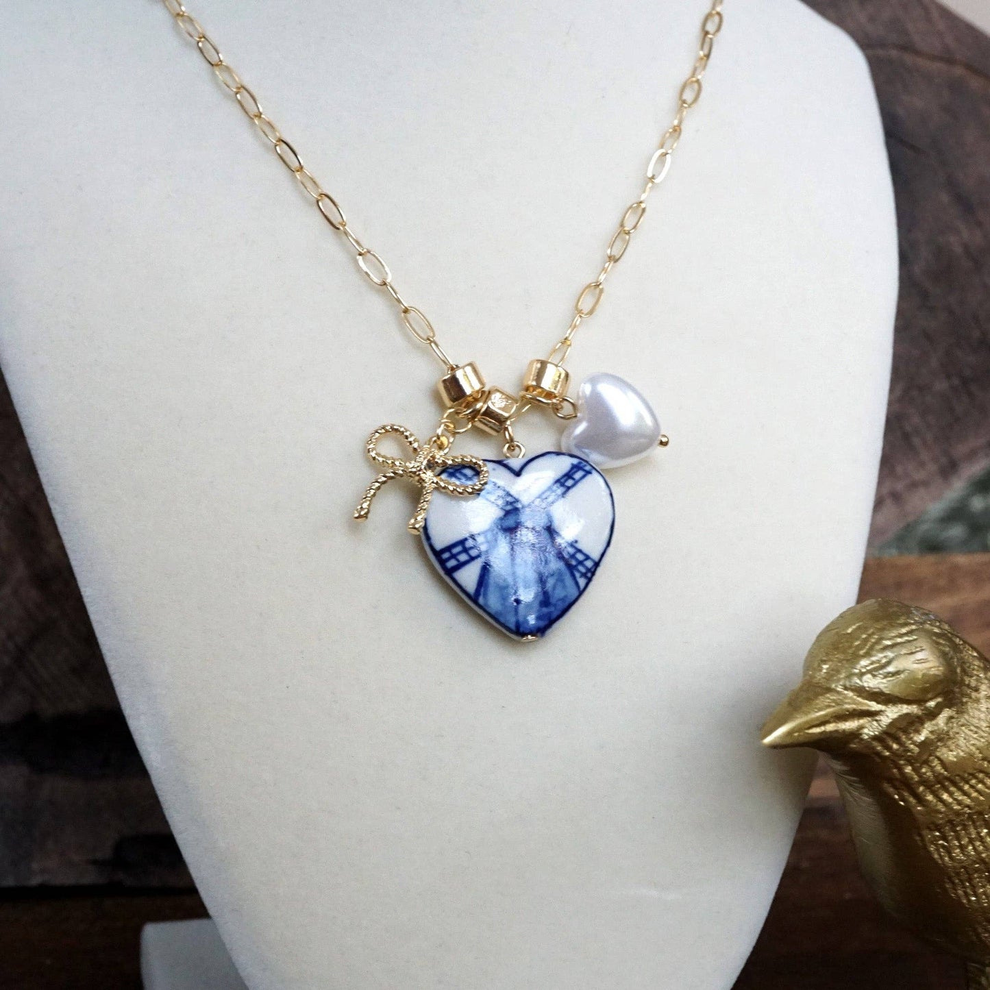 Multi-Charm Chinoiserie Heart & Bow Necklace – Blue & Gold