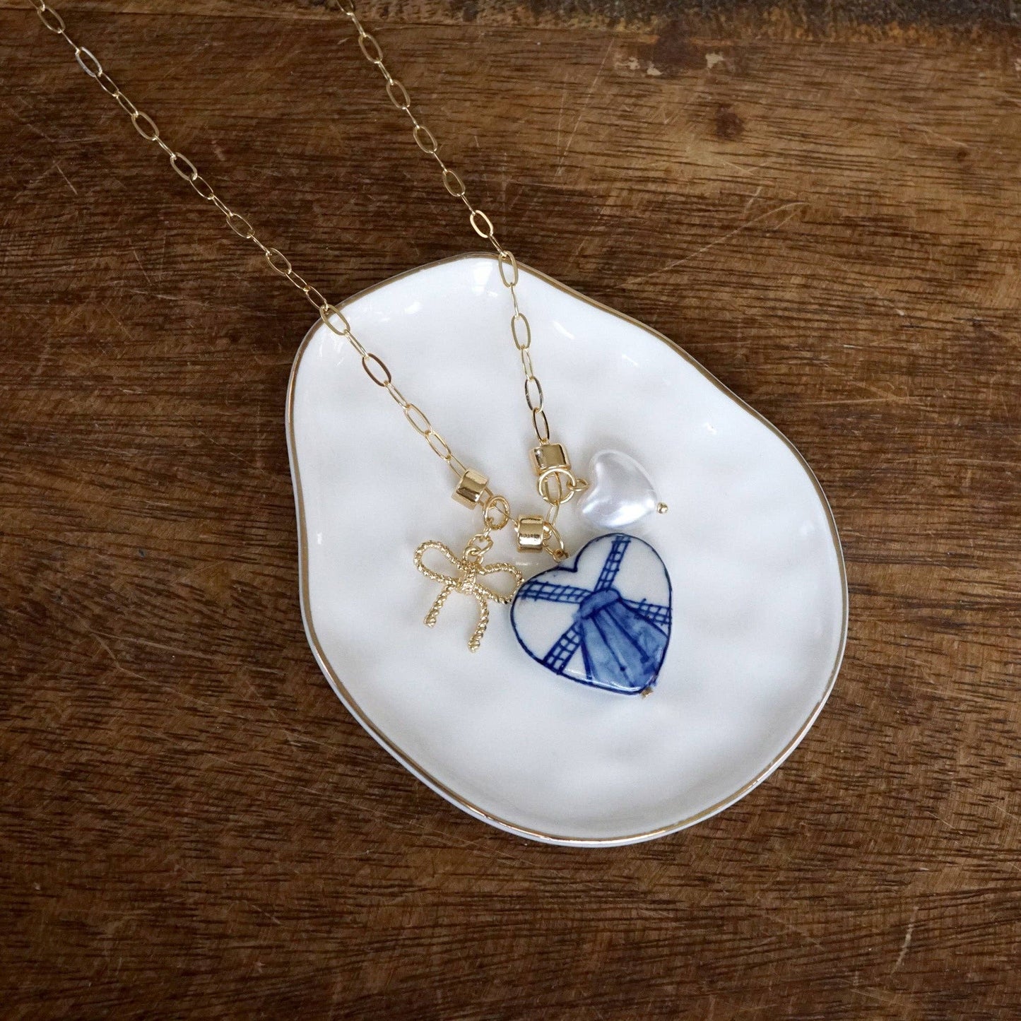 Multi-Charm Chinoiserie Heart & Bow Necklace – Blue & Gold