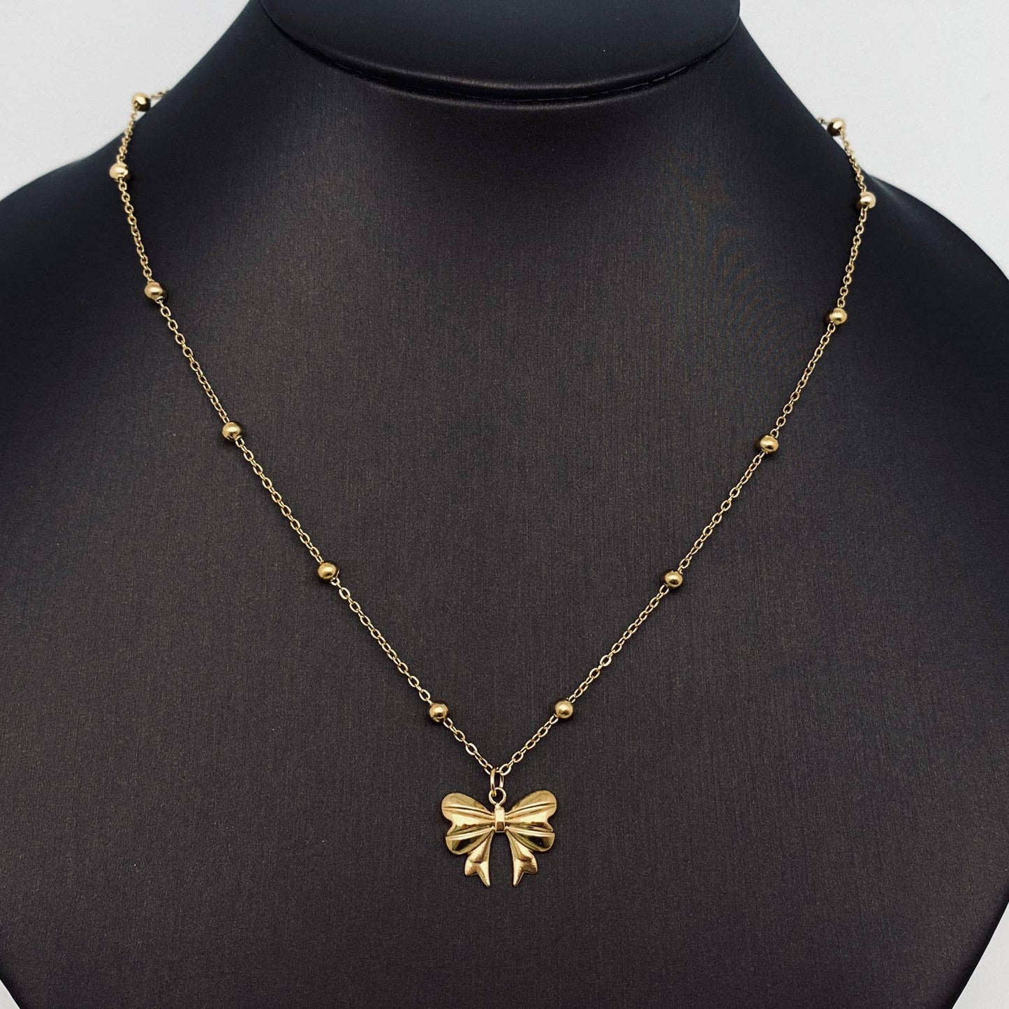 Gold Plated Stainless Steel Bow Pendant Necklace - FGS